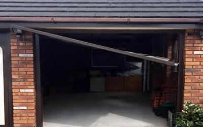 picture of a broken garage door